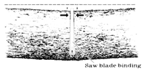 
When a log is supported under, both ends, never allow saw blade to get pinched in the cut by trying to cut through the timber in one pass. Always cut on the compression side first and the tension side last.
